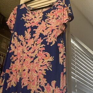 This is a Lilly Pulitzer blue dress with pink coral. I have loved this piece.